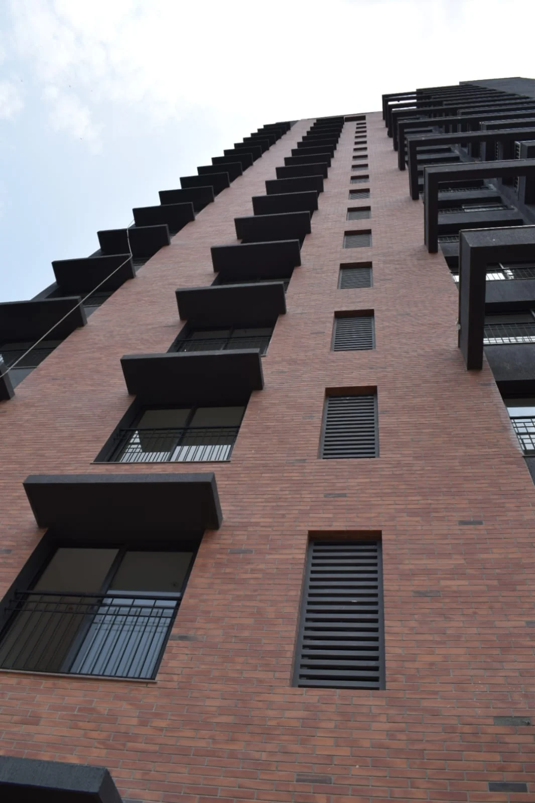 Residential facade with balcony railings